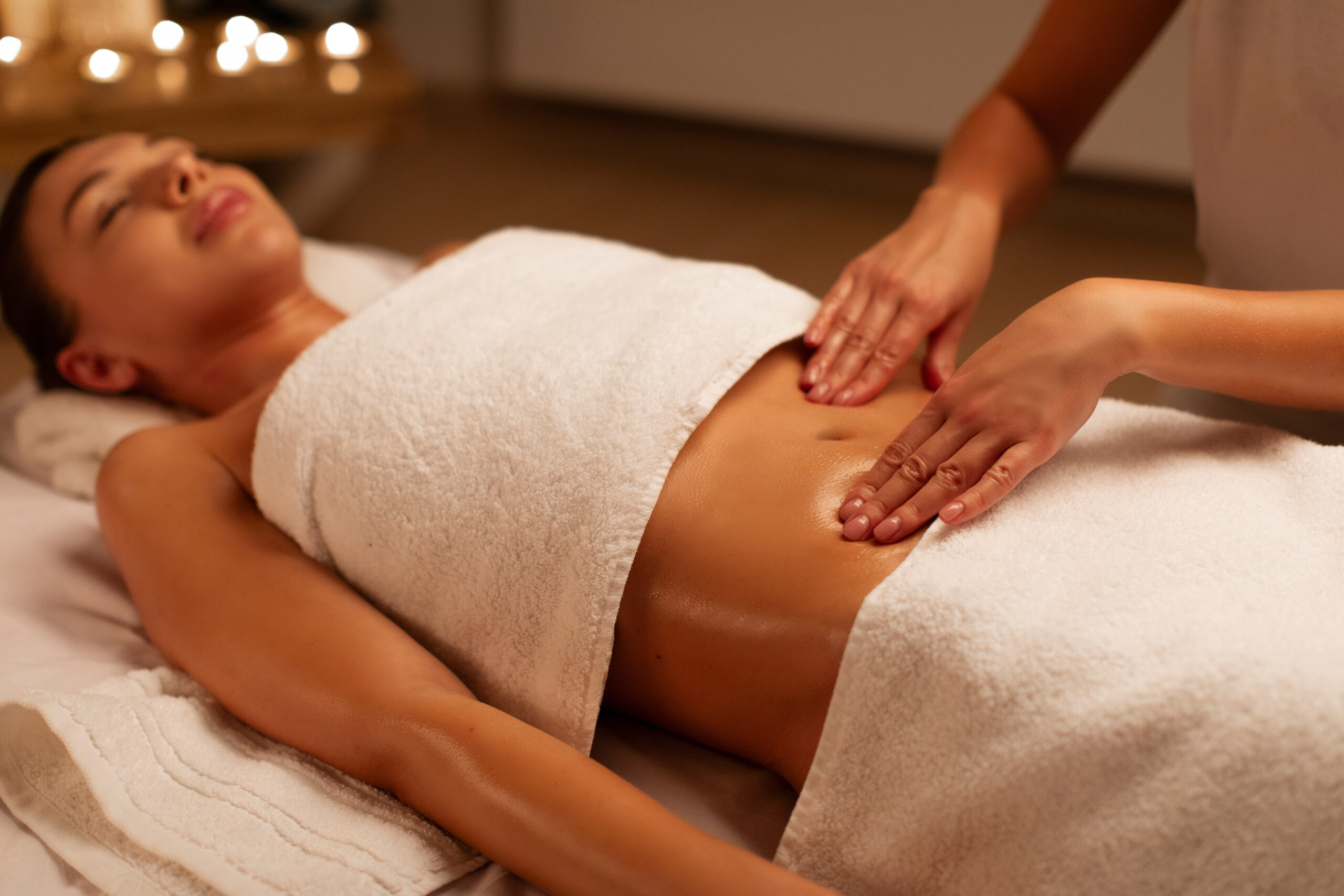 Holistic therapist in Walsall providing a gentle abdominal massage