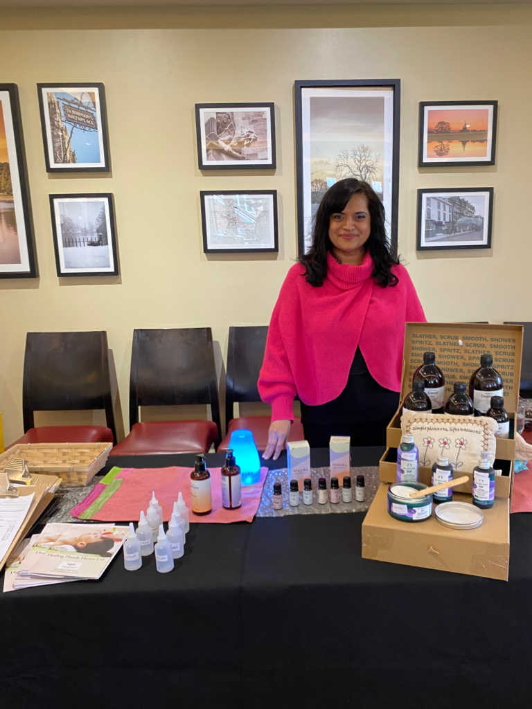 Mindy from Healing Hands Haven with holistic wellbeing products and self care tools